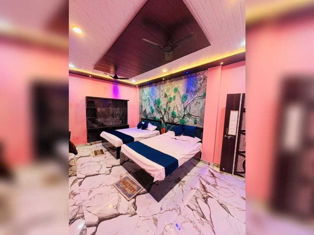 Ένα ή περισσότερα κρεβάτια σε δωμάτιο στο Hotel O The Baba Guest House