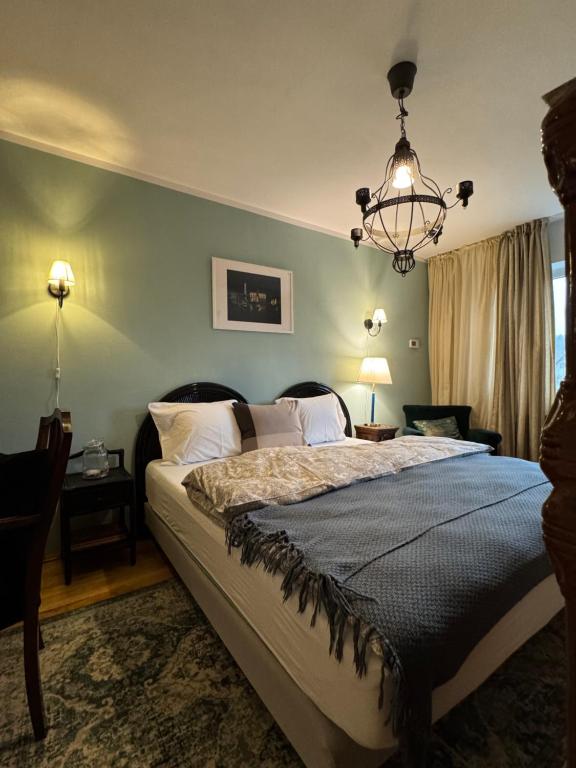 Giường trong phòng chung tại Bohemian Chalet