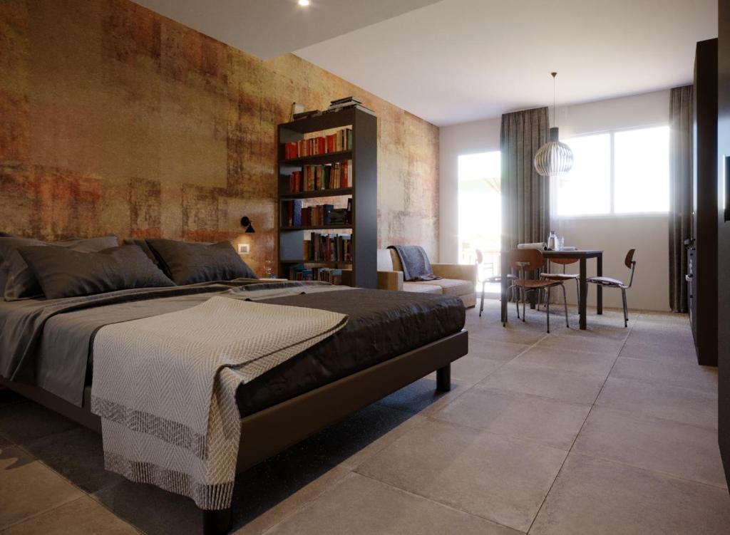 Giường trong phòng chung tại HB Appartamenti Suite