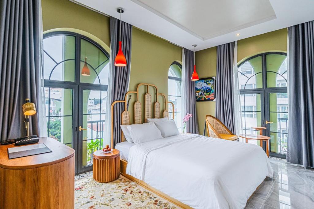 Ένα ή περισσότερα κρεβάτια σε δωμάτιο στο An Lac Saigon Airport Apartment for week and month stay