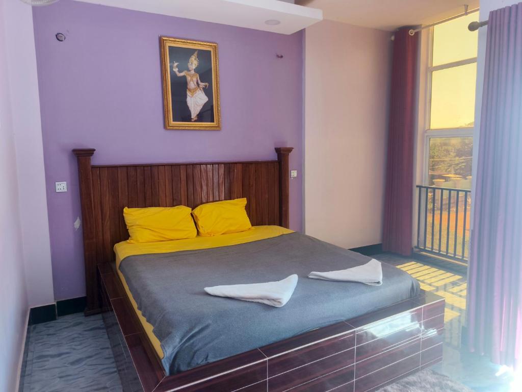 Postel nebo postele na pokoji v ubytování VibeHostel