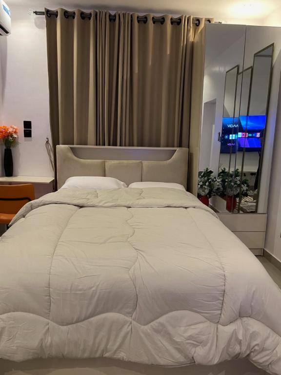 Ένα ή περισσότερα κρεβάτια σε δωμάτιο στο The Haven