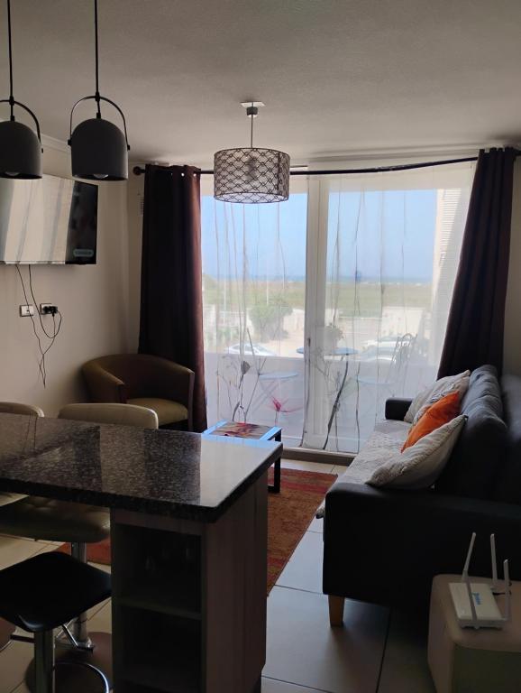 Posezení v ubytování DEPARTAMENTO AVENIDA PACIFICO. SECTOR PUERTA DEL MAR