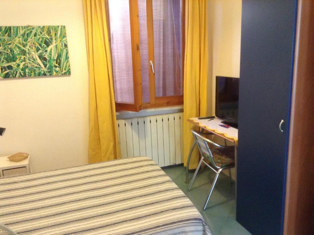 Posteľ alebo postele v izbe v ubytovaní Casa Fornaciari
