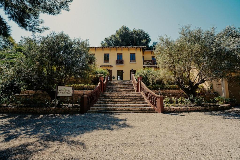 a set of stairs leading to a building at Casa Rural 5 Estrellas en Totana in Totana