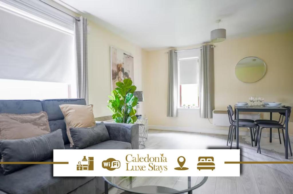 a living room with a couch and a table at Arranview Retreat in Airdrie