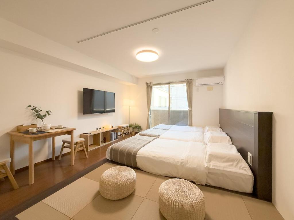 ISSHUKU NOMA池袋II 302 - Quad Room