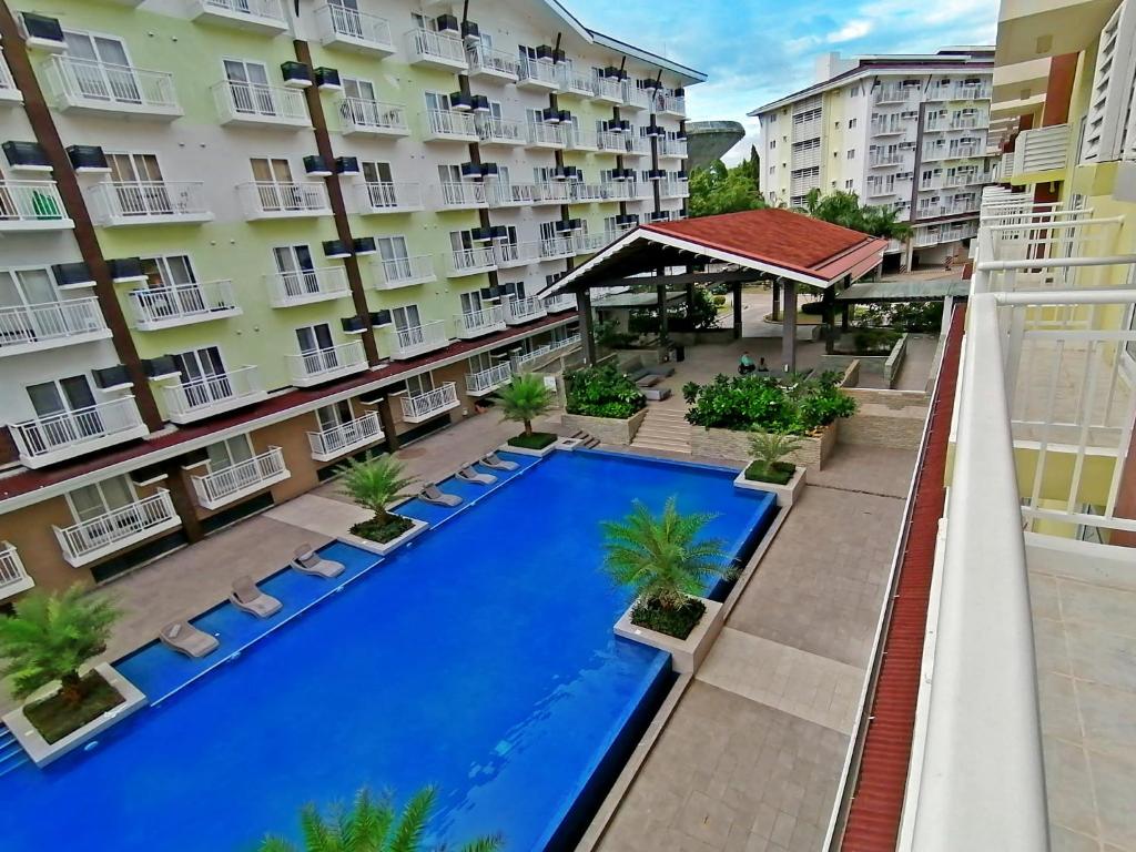 Πισίνα στο ή κοντά στο OVERTIME STAYCATION - Nearest to Airport with FREE POOL & GYM ACCESS