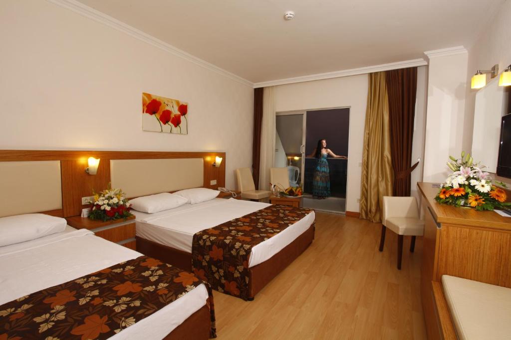Postel nebo postele na pokoji v ubytování Cenger Beach Resort Spa - All Inclusive