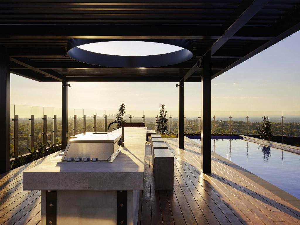 a bath tub on the roof of a house at Art Series - The Chen in Box Hill