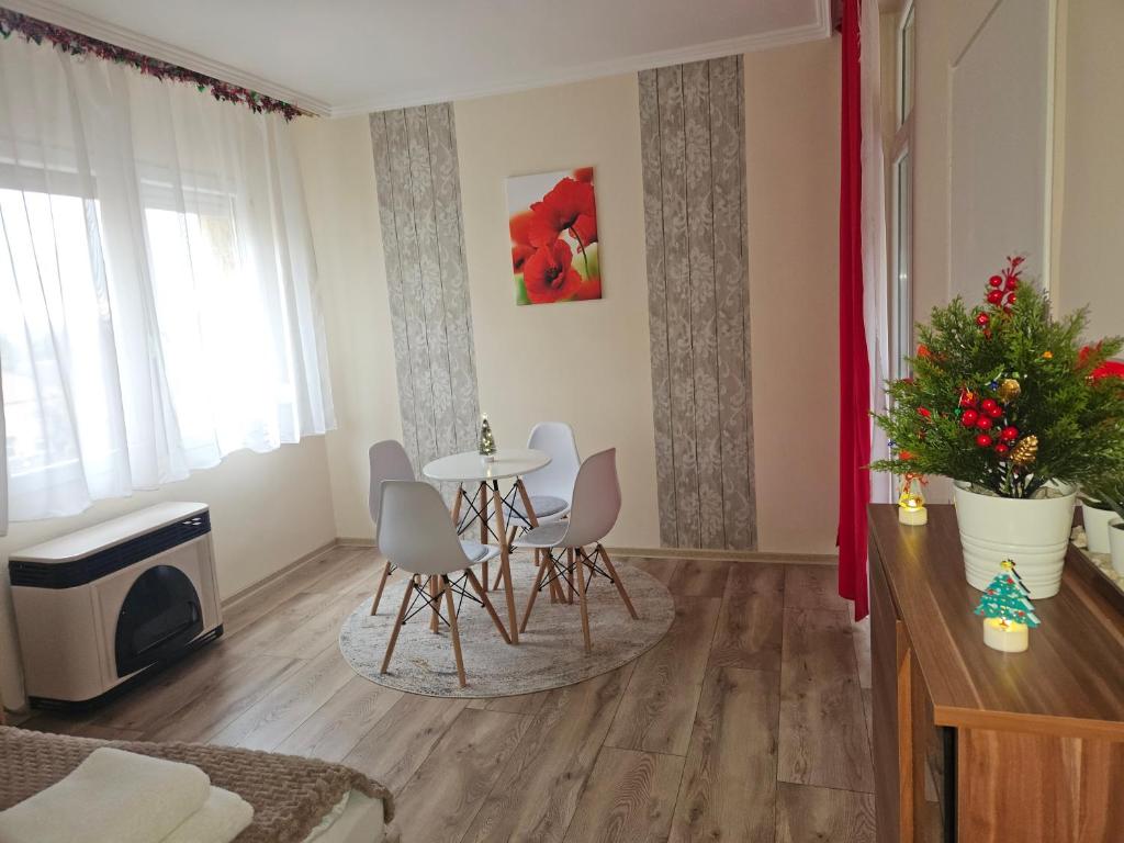 Posezení v ubytování Pipacs Apartman