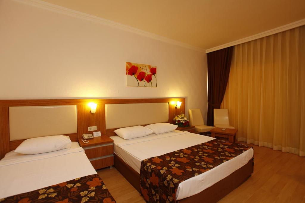 Postel nebo postele na pokoji v ubytování Cenger Beach Resort Spa - All Inclusive