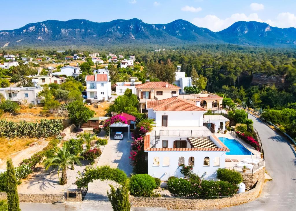 an aerial view of a house with a swimming pool at Villa Tranquillity by HolidayKeys in Kyrenia