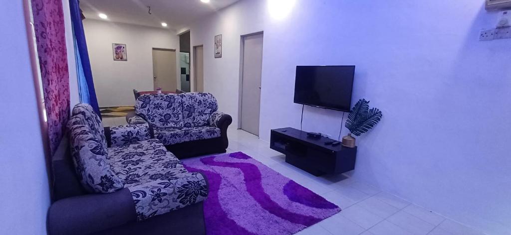 TV a/nebo společenská místnost v ubytování River Truss Homestay