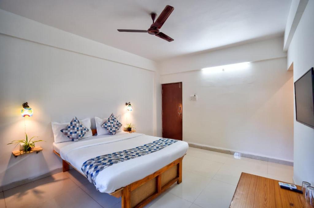 En eller flere senge i et værelse på Green Wave Luxury Resort