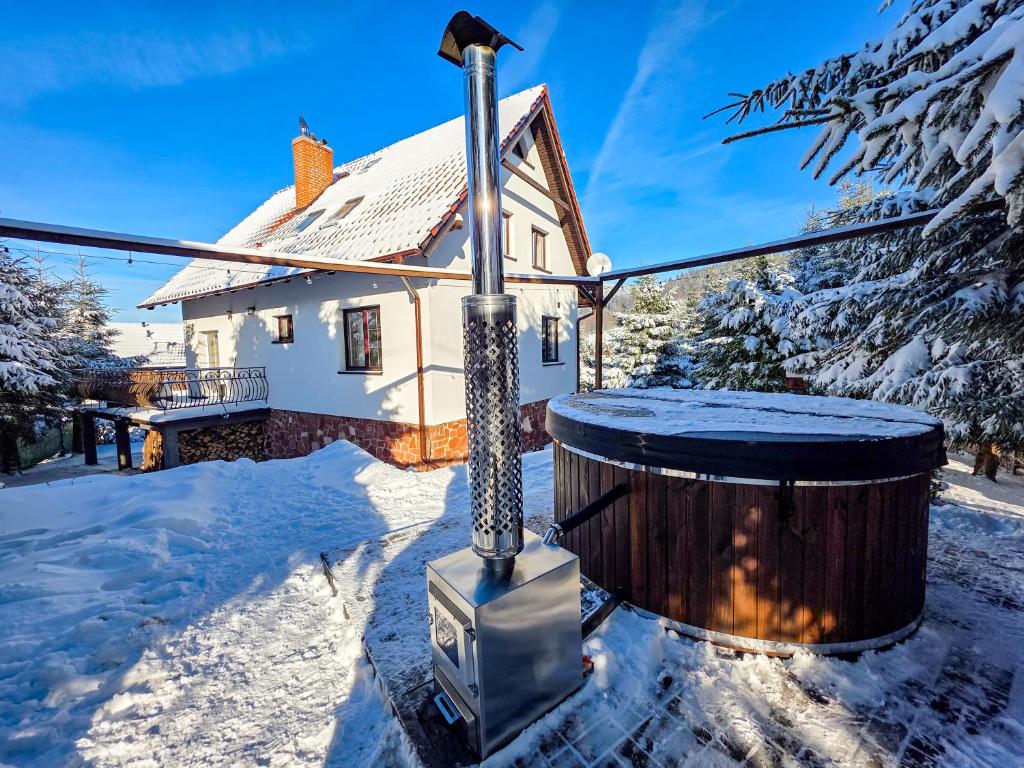 Το Dom nad Potokiem Sowa τον χειμώνα