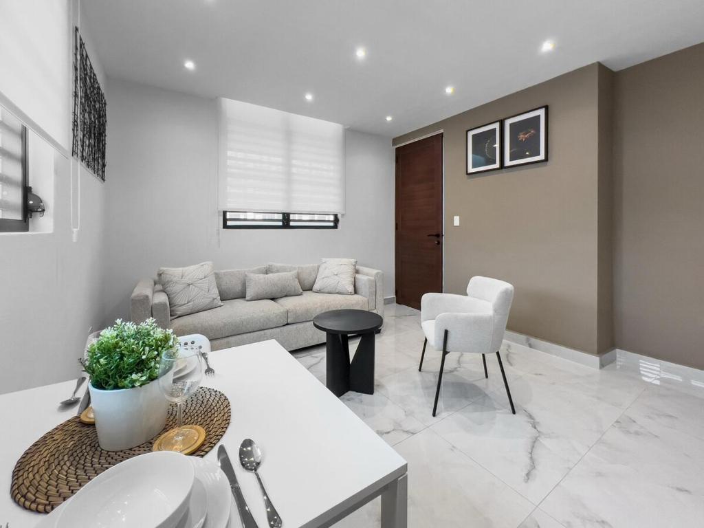 Χώρος καθιστικού στο Hyde Park 7 Comfy Apt With Parking in San Juan