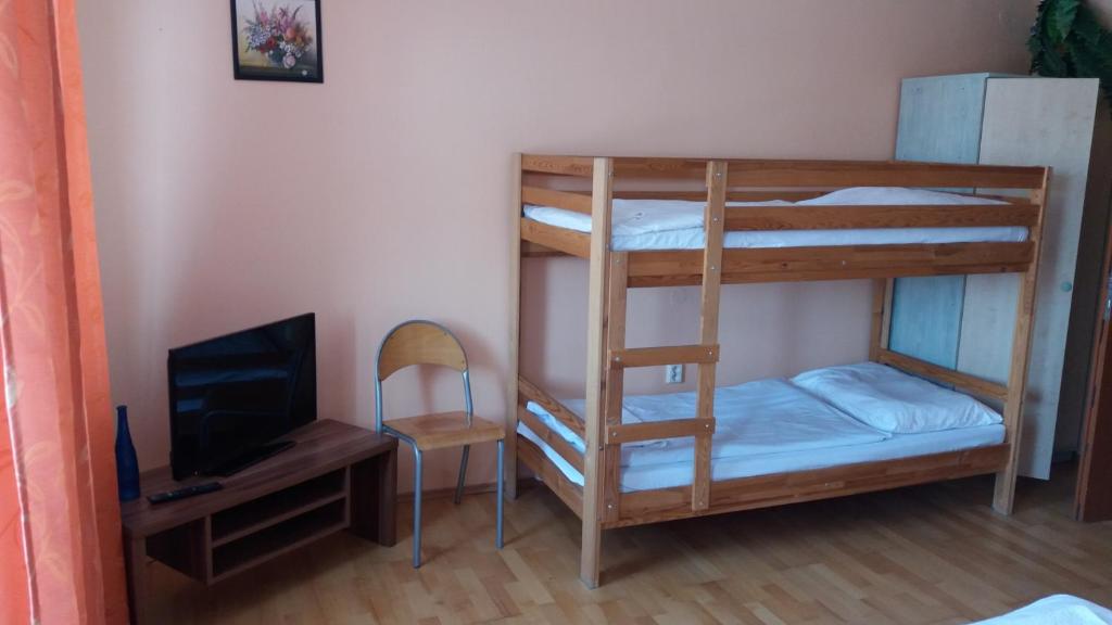 Postel nebo postele na pokoji v ubytování Retro Vrbovec