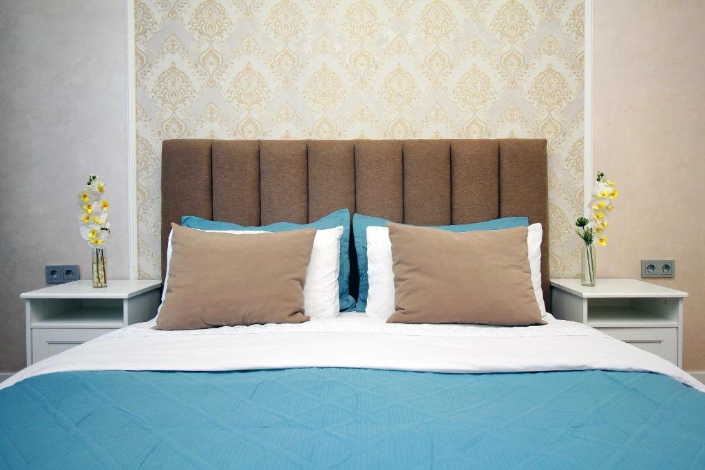 En eller flere senge i et værelse på Blueberry elegance