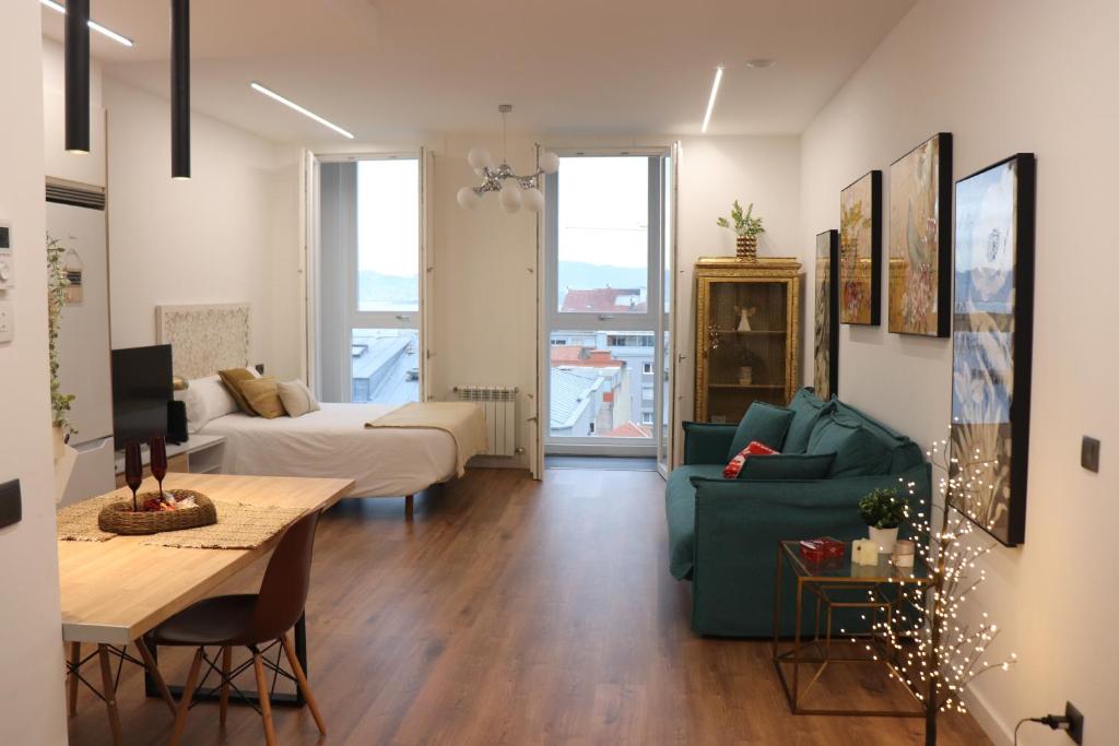 En eller flere senge i et værelse på Vigo bonito estudio en el centro