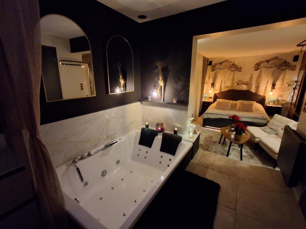 Ένα ή περισσότερα κρεβάτια σε δωμάτιο στο Bienvenue chez Glad et Guigui