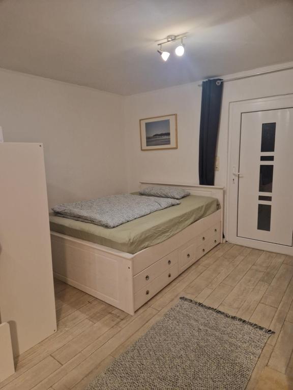 Postel nebo postele na pokoji v ubytování Bungalow 1Eickhof