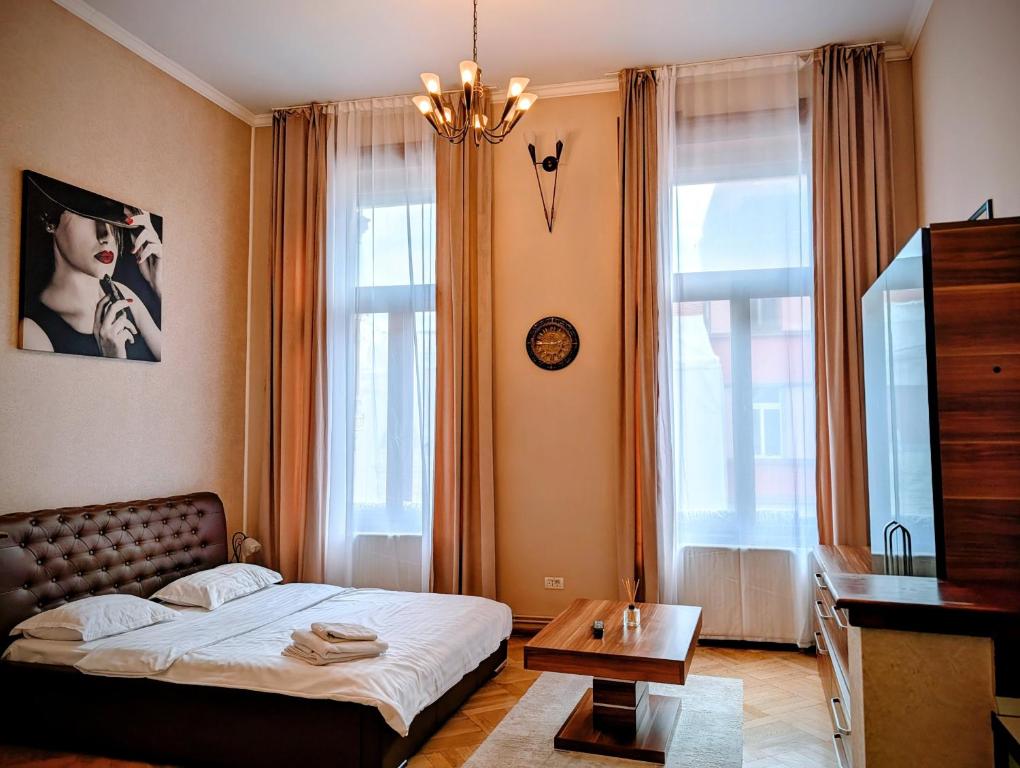 Postel nebo postele na pokoji v ubytování Select City Center Apartments