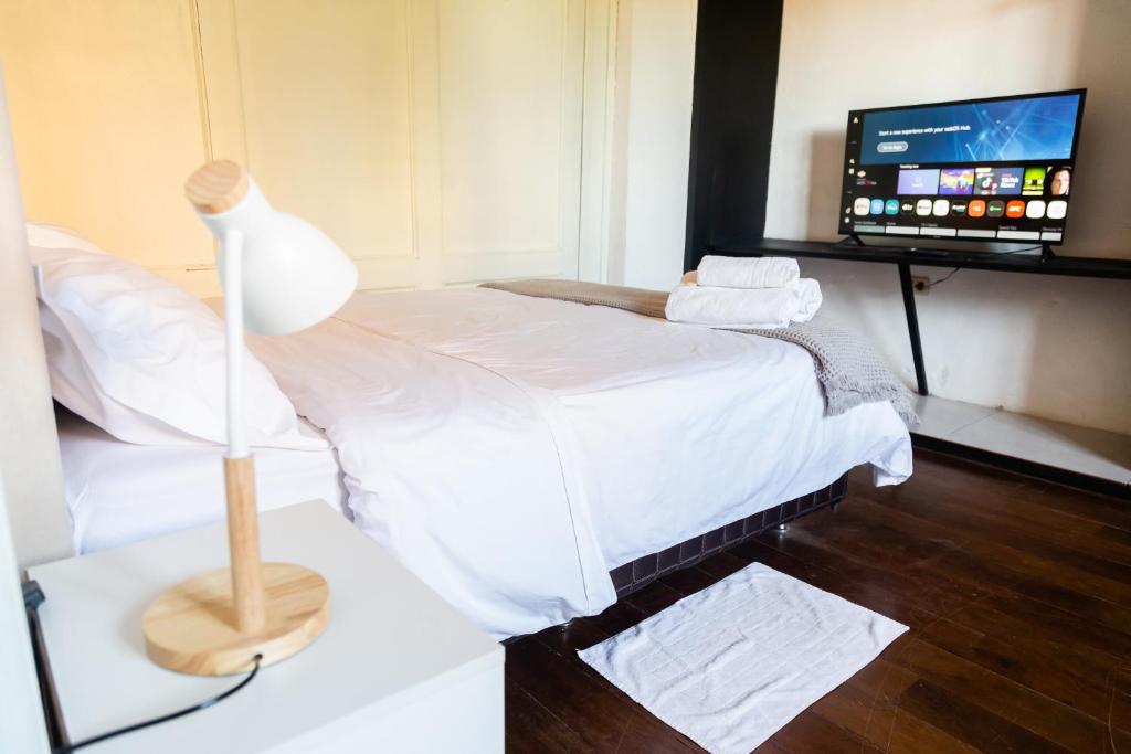 Postel nebo postele na pokoji v ubytování Altillo privado con desayuno artesanal en pleno centro