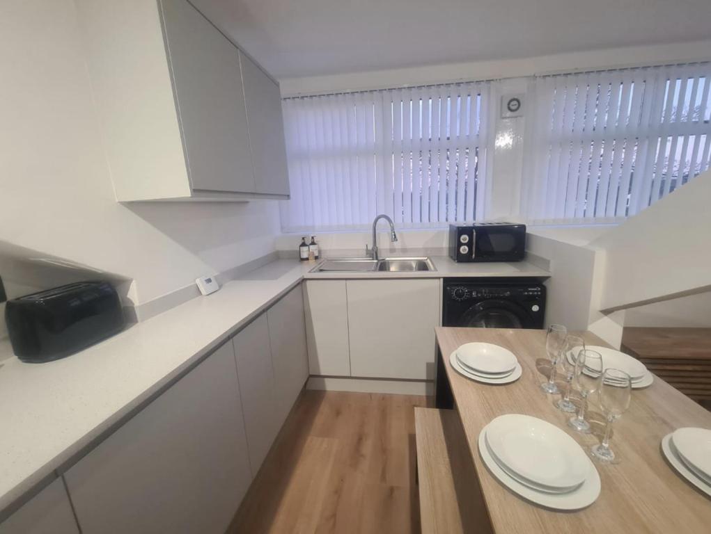 Η κουζίνα ή μικρή κουζίνα στο Stylish modern 2 bedroom apartment