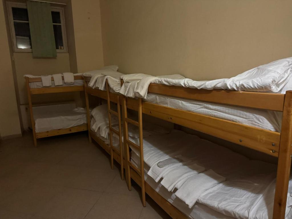 Postel nebo postele na pokoji v ubytování Lucky Hostel