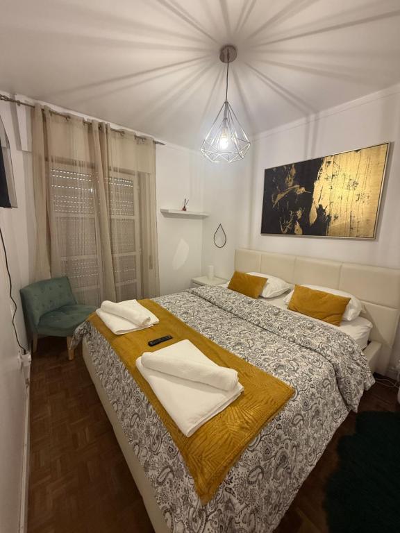 En eller flere senge i et værelse på Apart Lisbon Airport