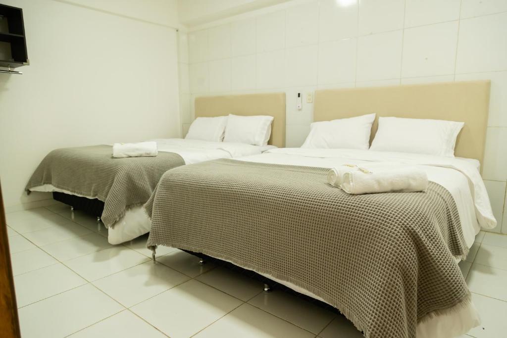 Postel nebo postele na pokoji v ubytování 2 habitaciones con baño privado y cocina equipada en el centro de Asunción