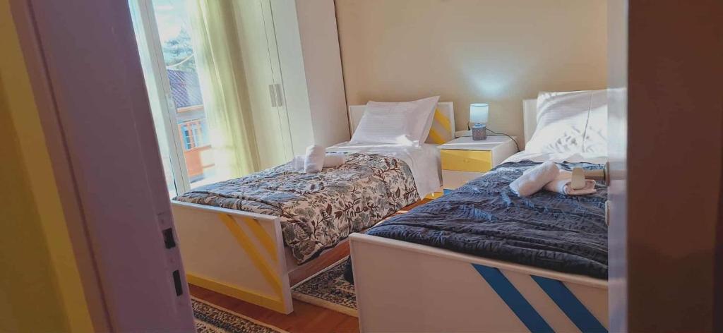 Ένα ή περισσότερα κρεβάτια σε δωμάτιο στο levanta