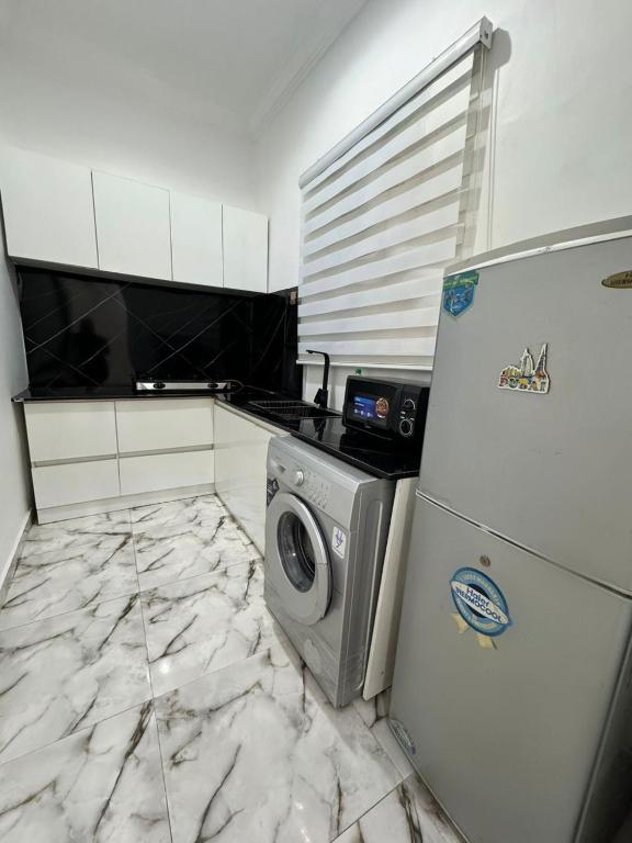 Η κουζίνα ή μικρή κουζίνα στο Swanky Spaces