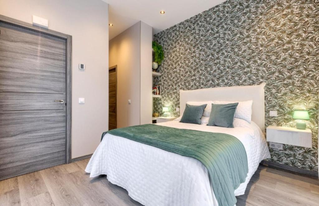 Ένα ή περισσότερα κρεβάτια σε δωμάτιο στο Madrid Apt 4 rooms 4 bathrooms