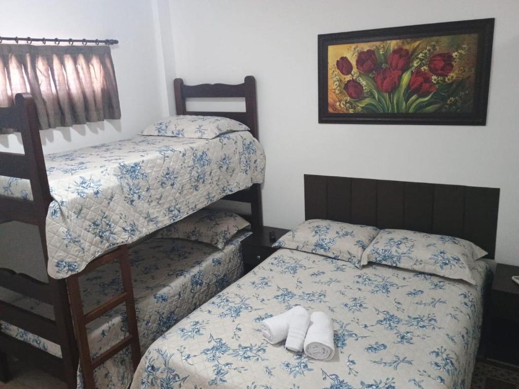 Кровать или кровати в номере Kitnet no interior de São Paulo 25