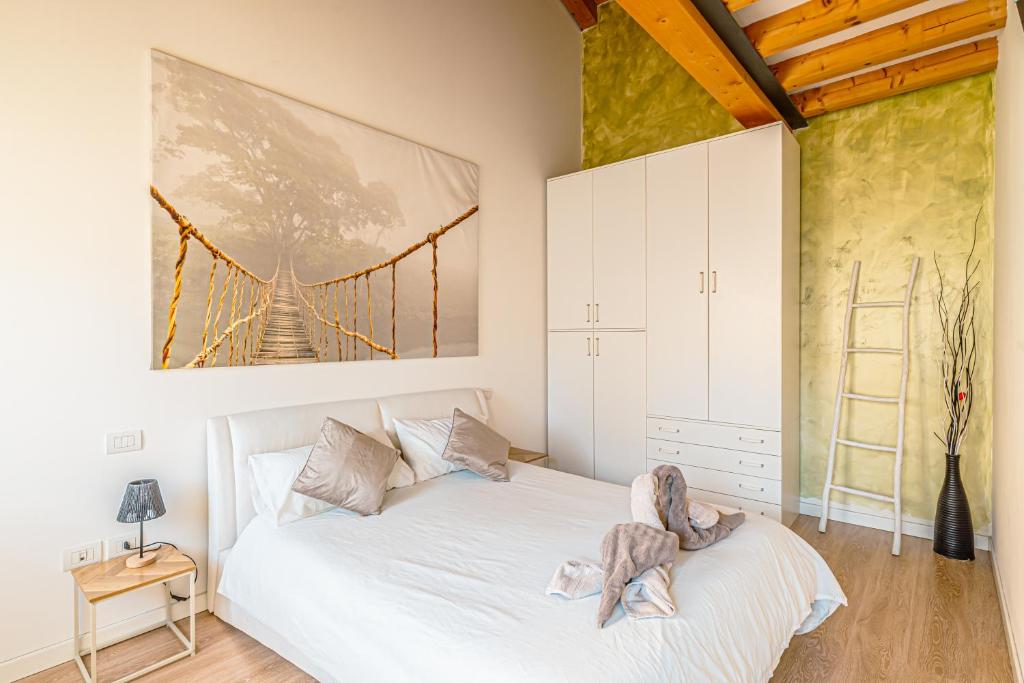 Postel nebo postele na pokoji v ubytování Ca Mantoet - The Green Loft with terrace