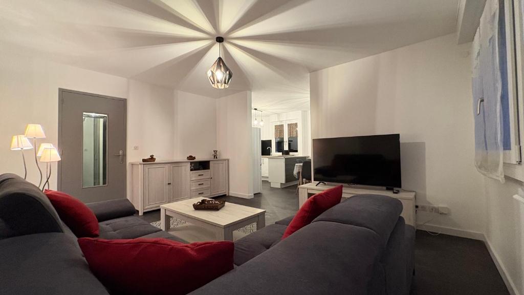 Et tv og/eller underholdning på Bel appartement ski les 3 vallées et Thermalisme