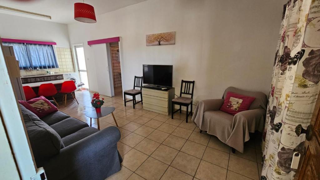 TV a/nebo společenská místnost v ubytování Sea Apartments