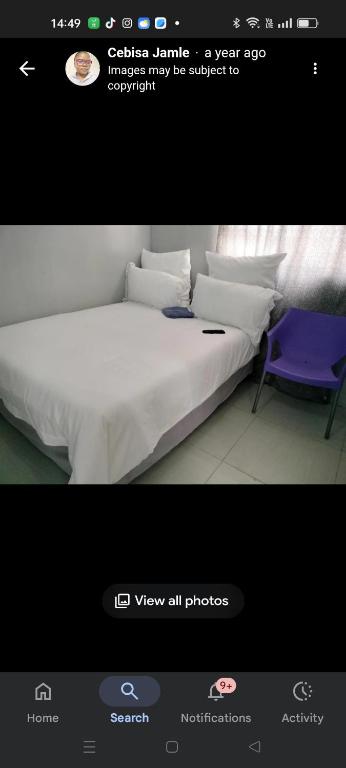 Giường trong phòng chung tại N2 Village BnB