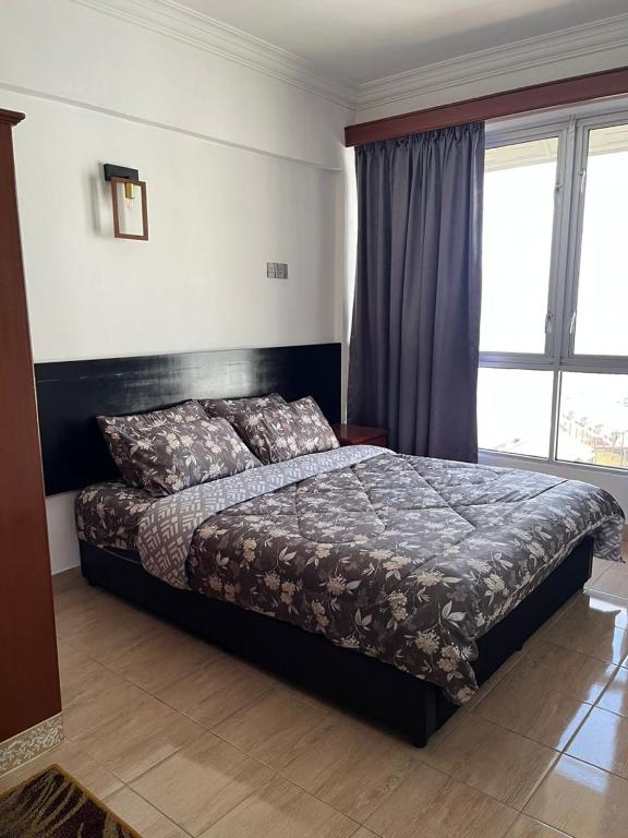 Postel nebo postele na pokoji v ubytování Glory Beach Resort Private Penthouse Apartment