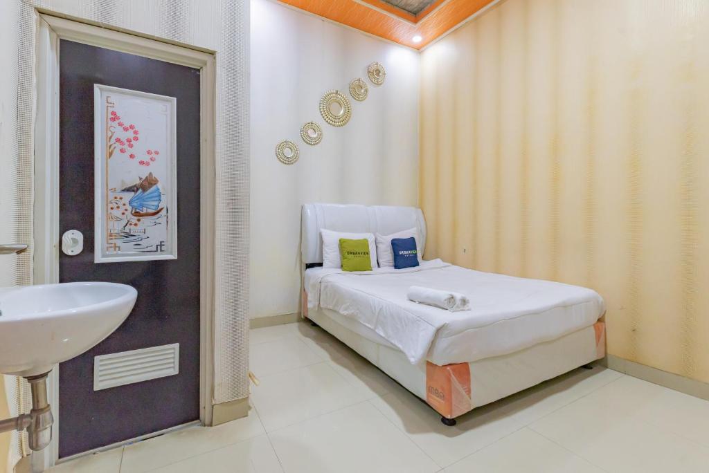 Urbanview Hotel Rifal Home Tegal - Chambre Double Supérieure