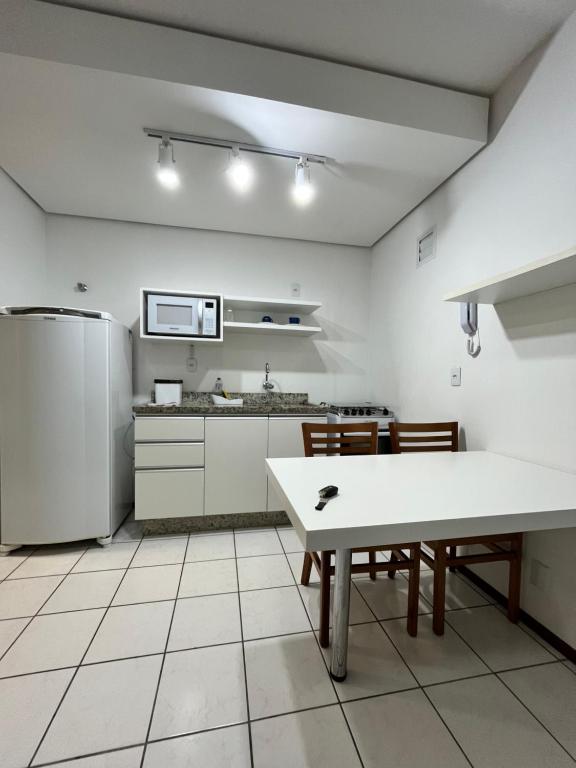 Η κουζίνα ή μικρή κουζίνα στο Residencial Nova Vista