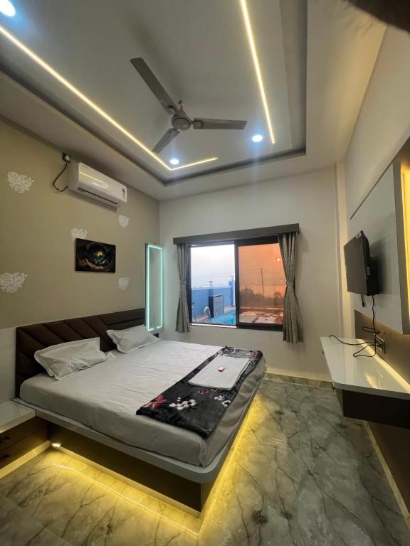 Ένα ή περισσότερα κρεβάτια σε δωμάτιο στο Sharayuu Villa