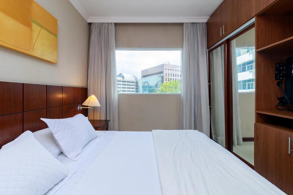 Postel nebo postele na pokoji v ubytování Ellegance Verbo Divino