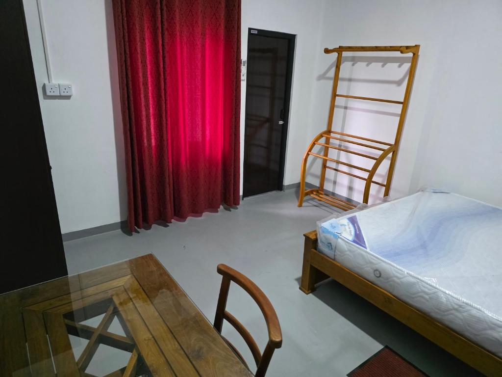 En eller flere senge i et værelse på Leisure Sunshine