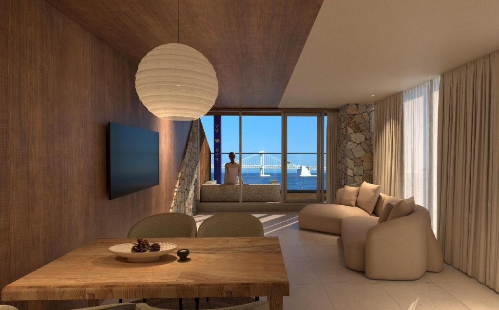 Khu vực ghế ngồi tại 루미에르 프리미엄 오션뷰 및 브리지뷰 룸 04-광안리 해수욕장