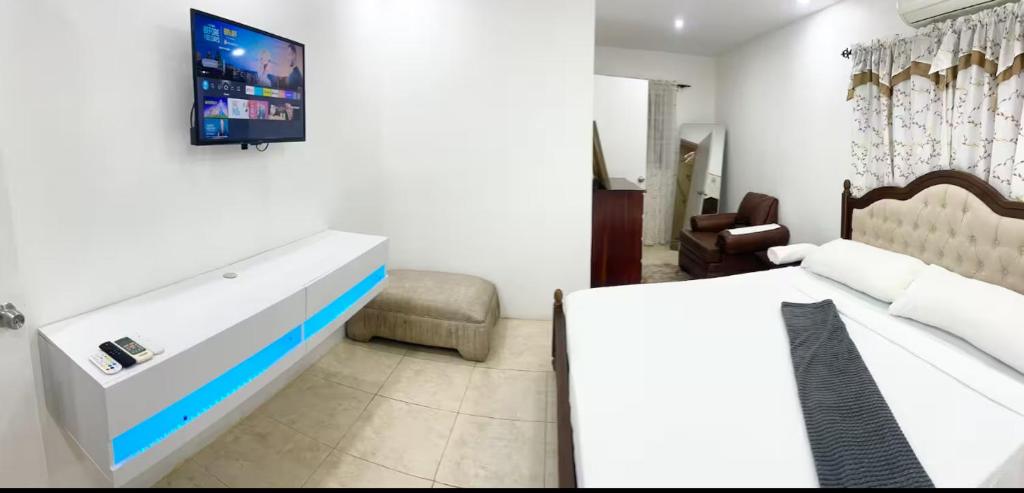 Ένα ή περισσότερα κρεβάτια σε δωμάτιο στο Suite Ocho Rios