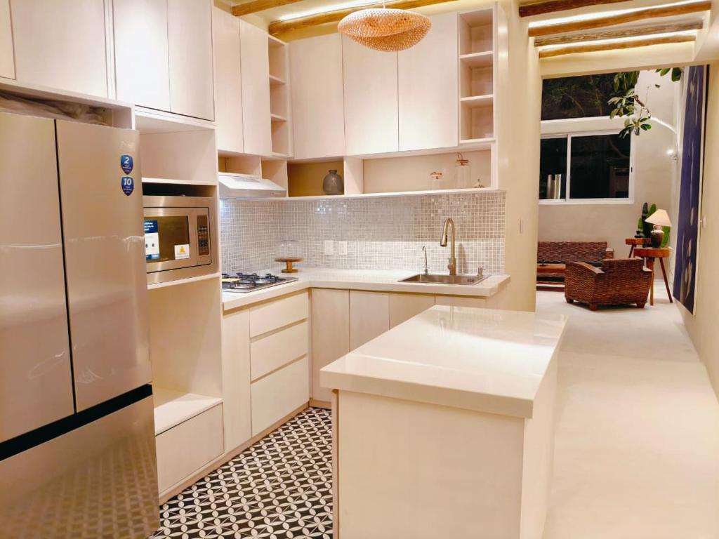 Η κουζίνα ή μικρή κουζίνα στο Casa Rocka Boutique Breakfast & Beach Club included