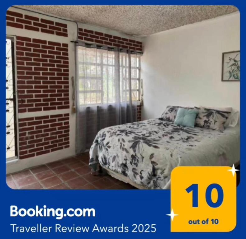 Postel nebo postele na pokoji v ubytování Little House Panajachel